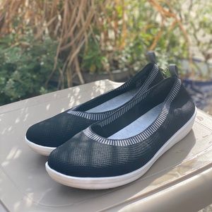 Women’s black Clarks flats
